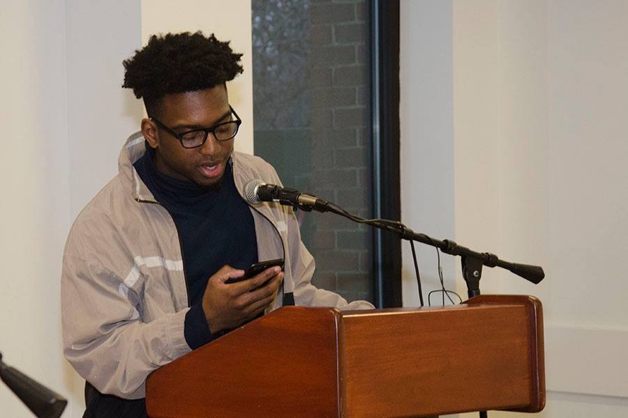 Corey Jackson reading a poem