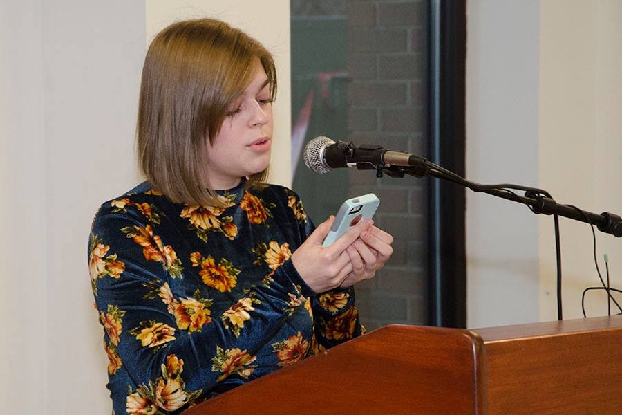 Elise Loux reads a poem