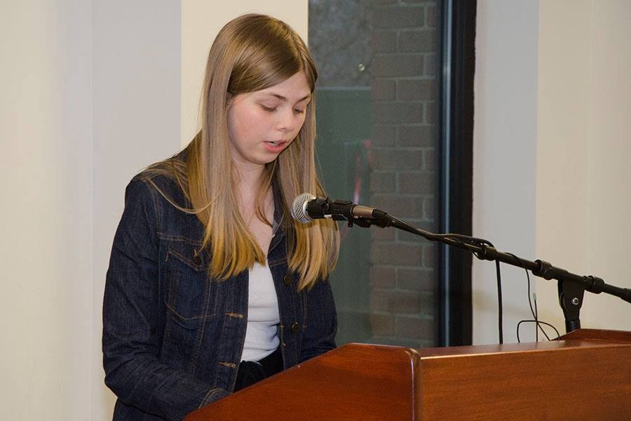 Kay Kemp reading a poem