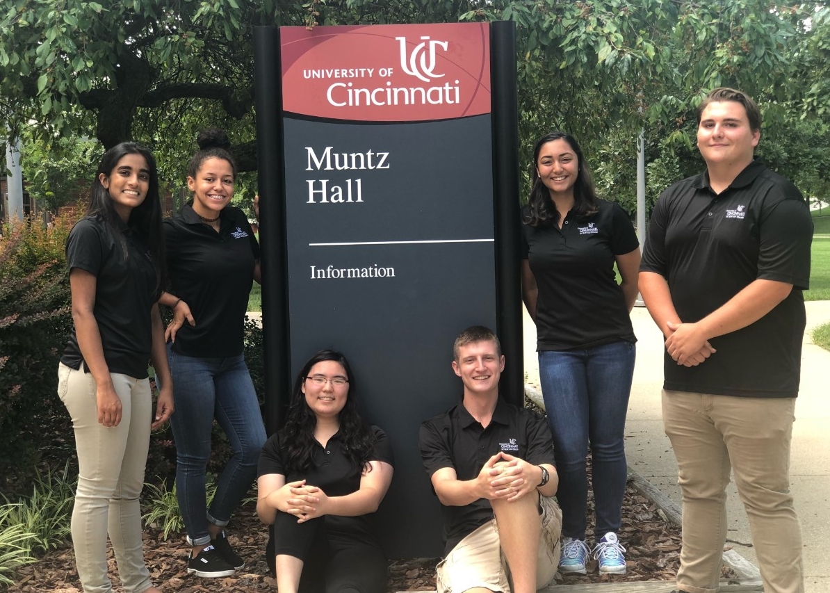 College Credit Plus students in front of Muntz Hall sign
