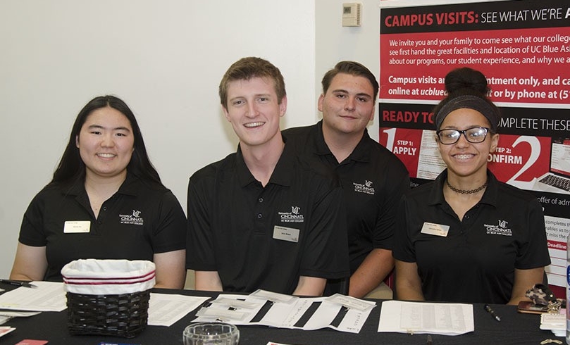 College Credit Plus students working at a welcome table