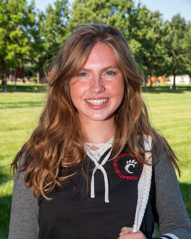 bearcat mascot with student