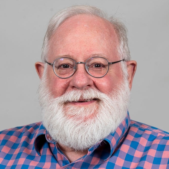 Headshot of H. Michael Sanders