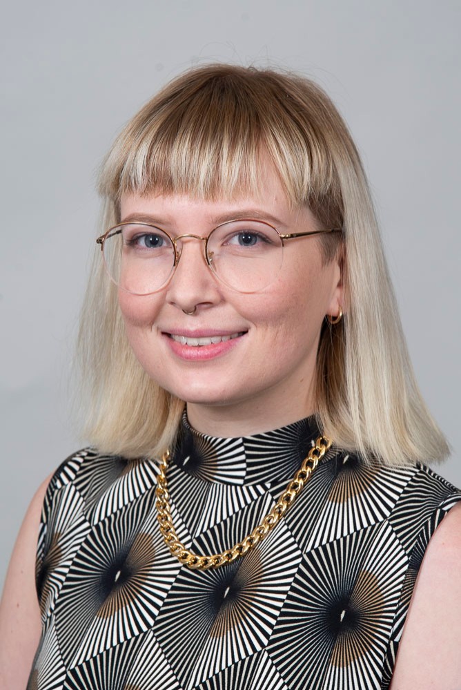 Headshot of Roo Hedrick