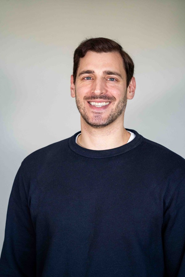 Headshot of Micah Savaglio,, PhD