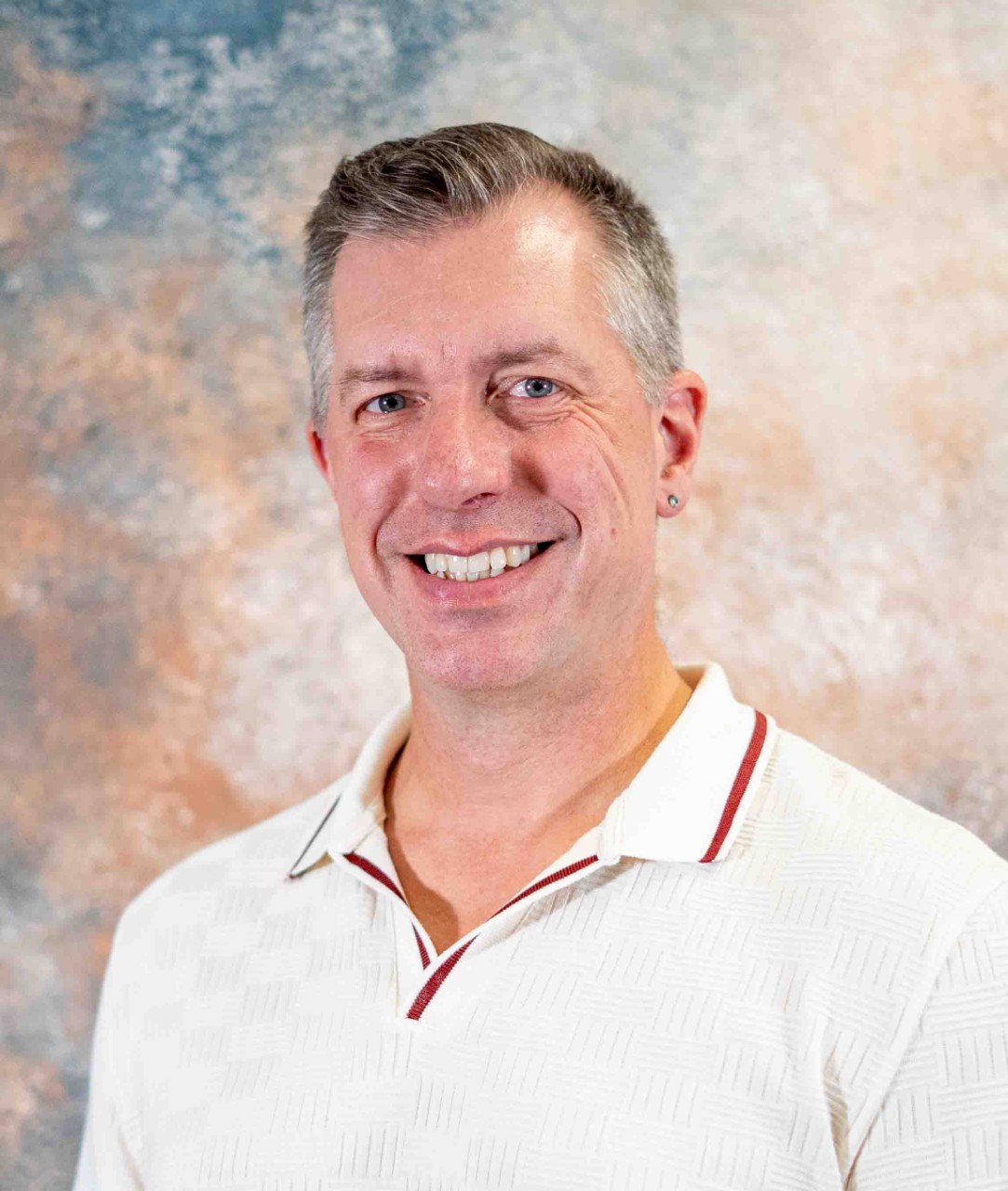 Headshot of Andrew Baker