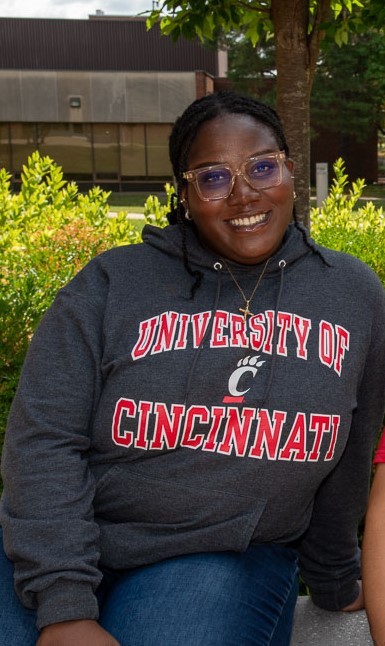 Cynthia Kudatsi outside on campus